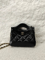Chanel 31 Bag Super Mini Black Shiny Calfskin Gold‑Tone Hardware Pre‑Owned Top Handle Chain Crossbody