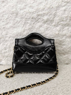 Chanel 31 Bag Super Mini Black Shiny Calfskin Gold‑Tone Hardware Pre‑Owned Top Handle Chain Crossbody