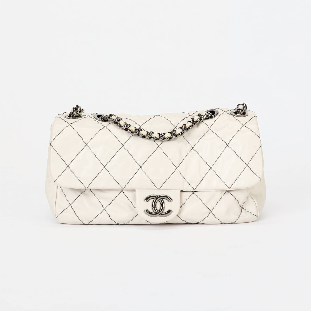 Chanel Flap Bag Off‑White Lambskin Contrast Black Stitching Ruthenium‑Tone Hardware