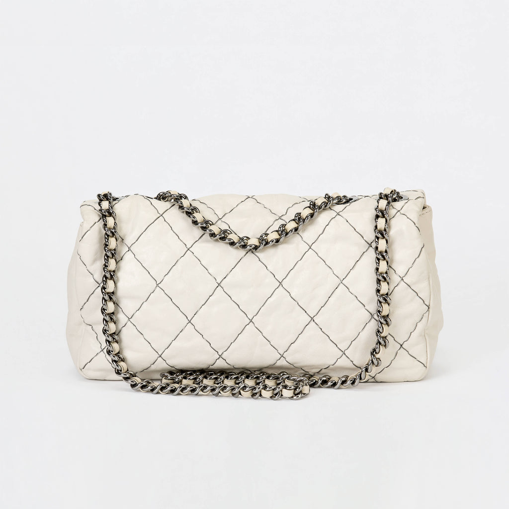 Chanel Flap Bag Off‑White Lambskin Contrast Black Stitching Ruthenium‑Tone Hardware