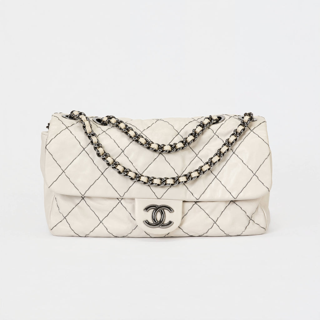 Chanel Flap Bag Off‑White Lambskin Contrast Black Stitching Ruthenium‑Tone Hardware