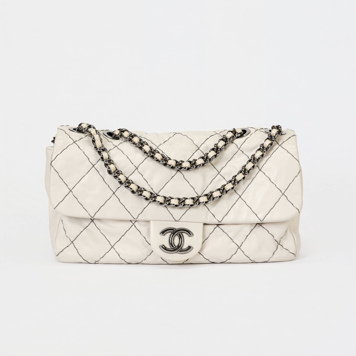 Chanel Flap Bag Off‑White Lambskin Contrast Black Stitching Ruthenium‑Tone Hardware