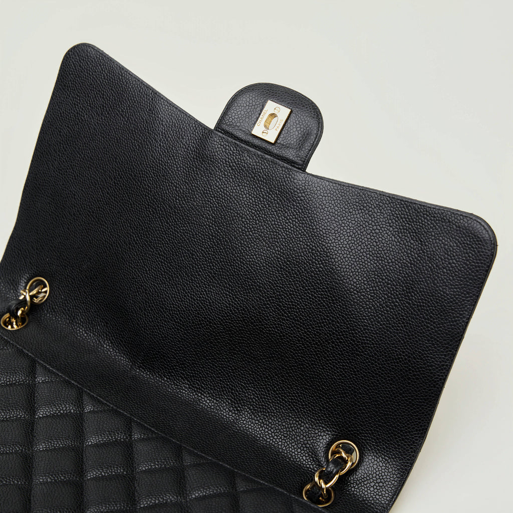 Chanel Classic Flap Maxi Black 
Caviar Gold Hardware Single Flap