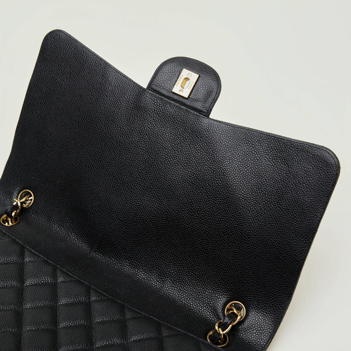 Chanel Classic Flap Maxi Black 
Caviar Gold Hardware Single Flap