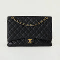Chanel Classic Flap Maxi Black 
Caviar Gold Hardware Single Flap