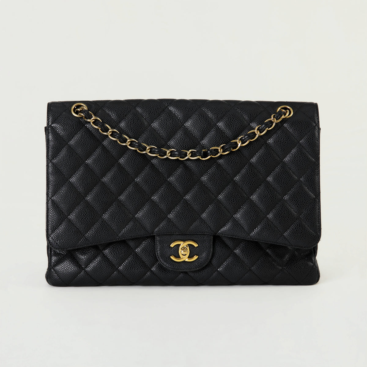 Chanel Classic Flap Maxi Black 
Caviar Gold Hardware Single Flap