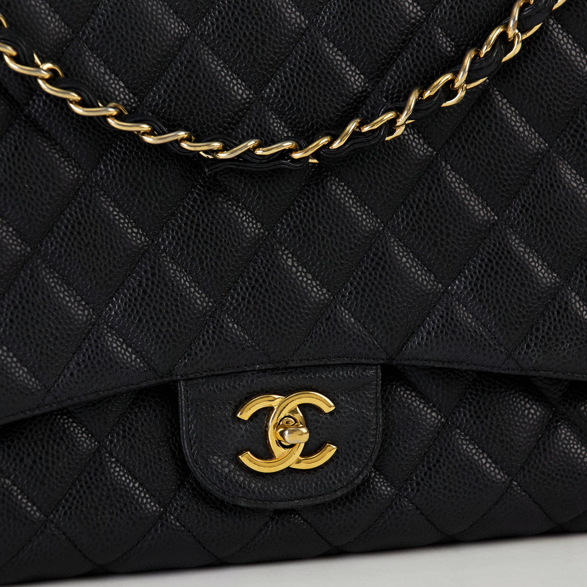 Chanel Classic Flap Maxi Black 
Caviar Gold Hardware Single Flap